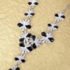 BLACK & CLEAR CRYSTAL STATEMENT NECKLACE WITH FLOWER STATIONS - Image 4