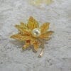 GOLDEN TEXTURED LEAF PIN WITH PEARL - Image 3