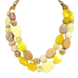 layered necklace with assortment of yellow polished stones and crystals