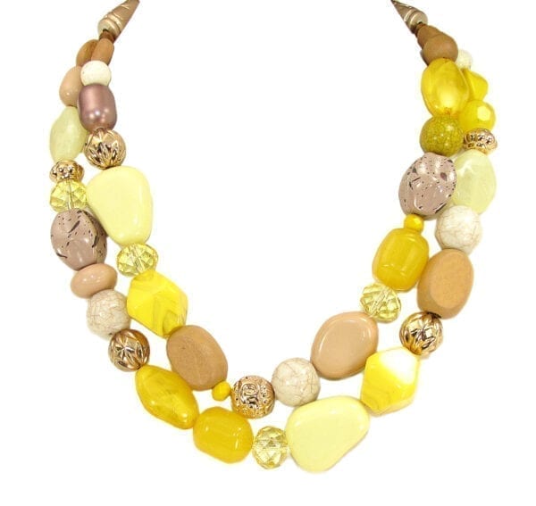 layered necklace with assortment of yellow polished stones and crystals