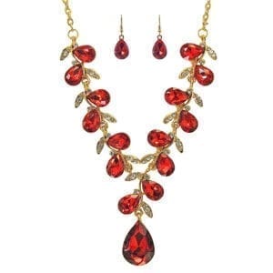gold necklace with teardrop ruby gems arranged like a vine