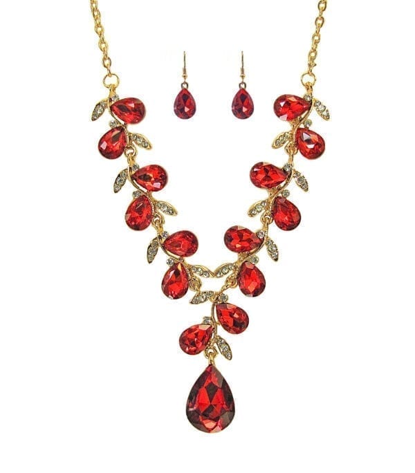 gold necklace with teardrop ruby gems arranged like a vine