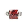 front view of a ring with square-cut garnet gem