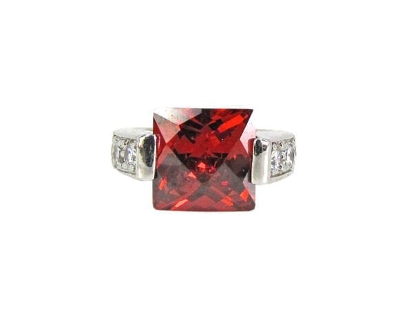 front view of a ring with square-cut garnet gem