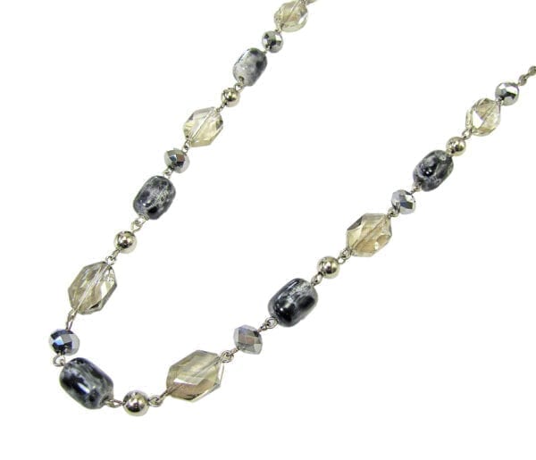 necklace with light yellow stones and silver beadwork