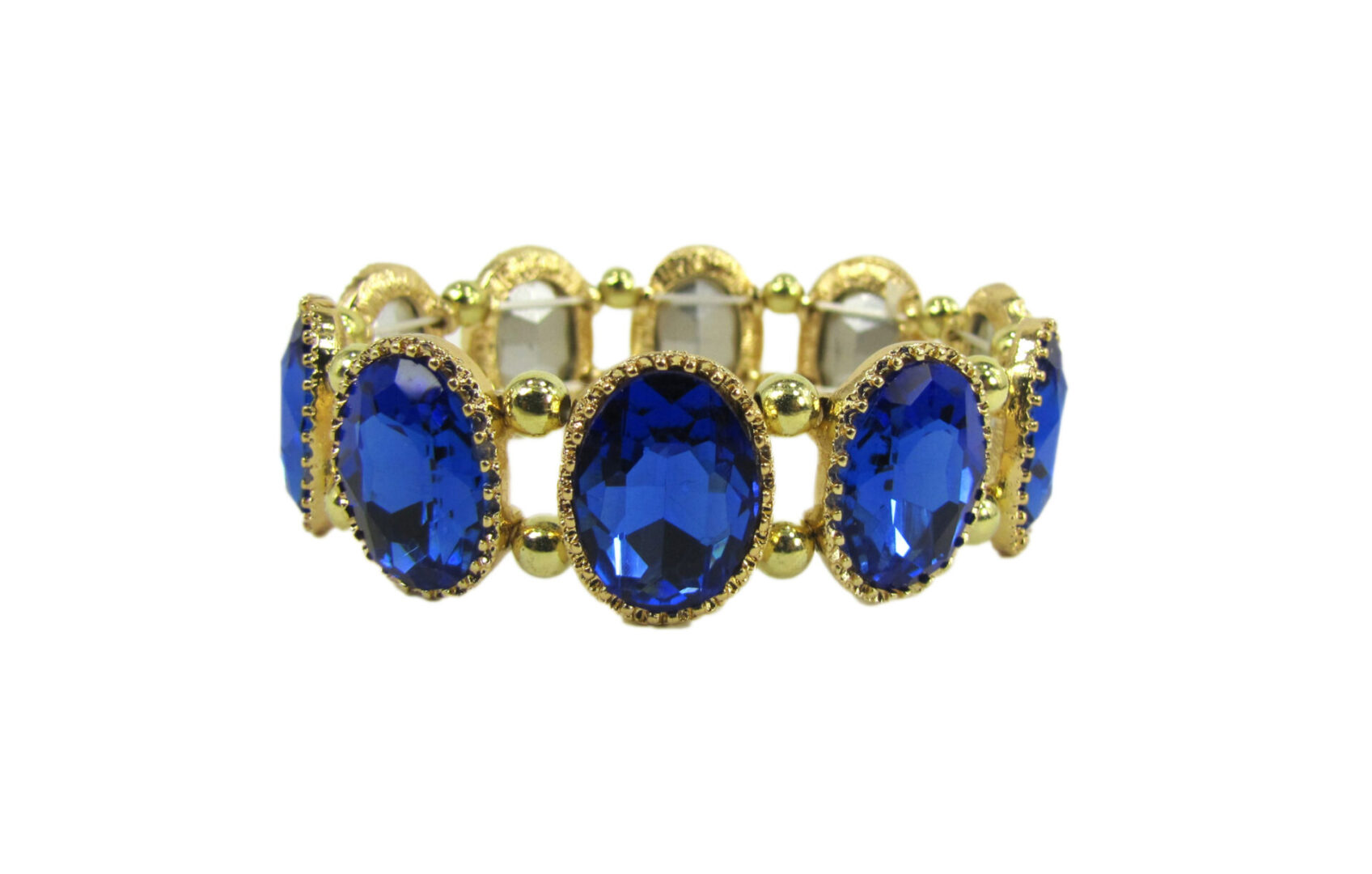 golden bracelet with deep blue gems