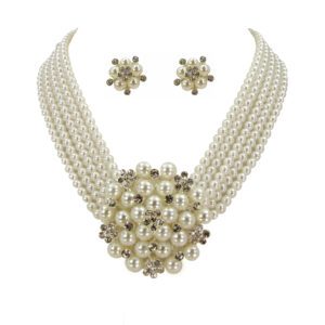 studded pearl necklace and a pair of earrings