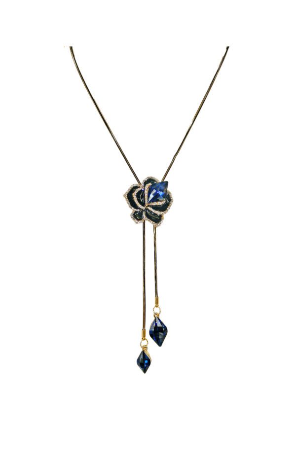 A blue crystal flower lariat necklace with pendant