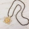 SPARKLING CRYSTAL FLOWER PENDANT NECKLACE - Image 2
