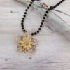 SPARKLING CRYSTAL FLOWER PENDANT NECKLACE - Image 3