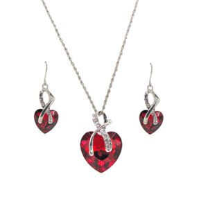 A large red crystal heart necklace and earrings set