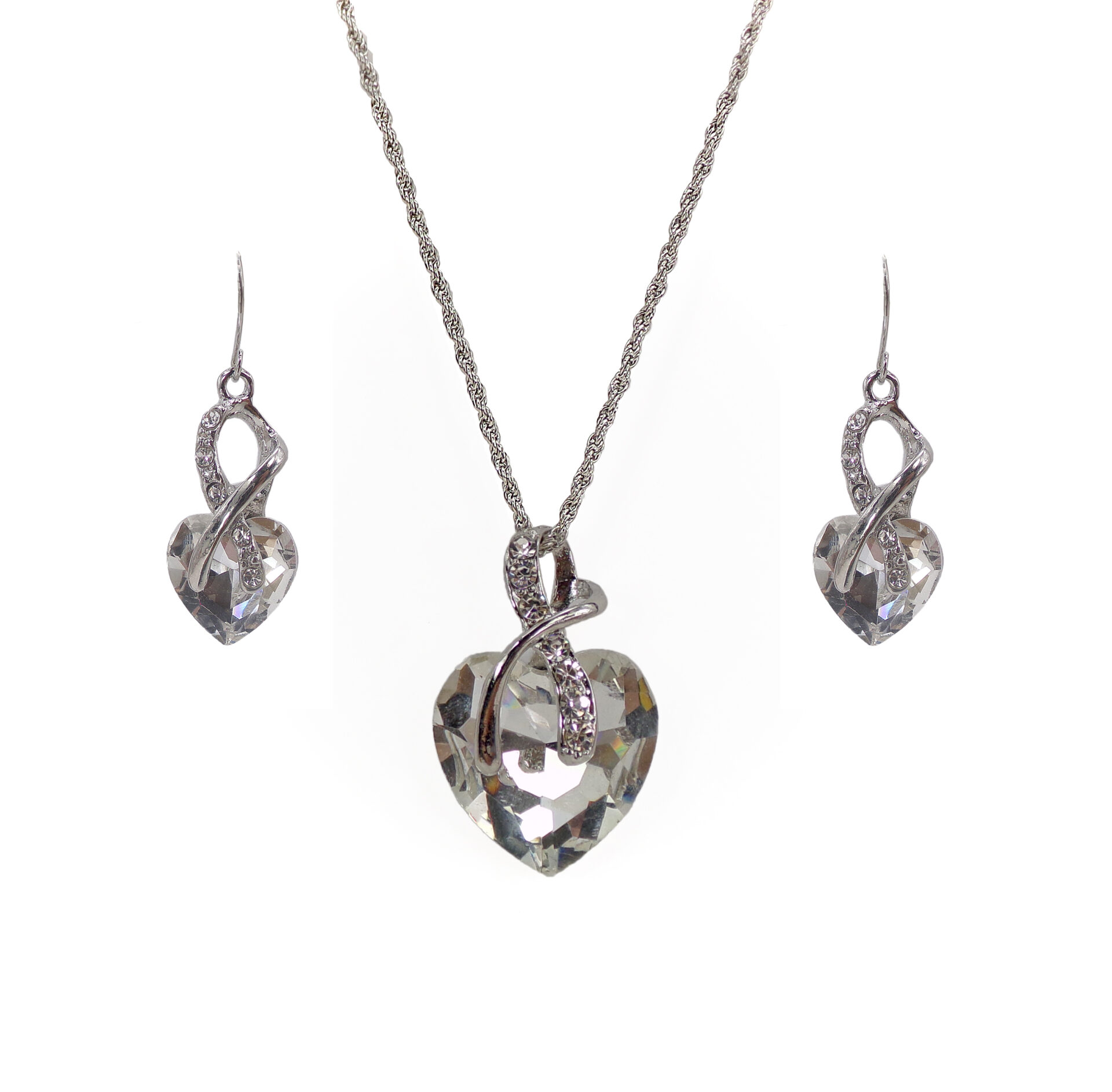 A large crystal heart pendant and earrings set