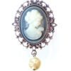 A Brooch With a Woman Figure With a Pearl Copy One