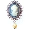 A Brooch With a Woman Figure With a Pearl
