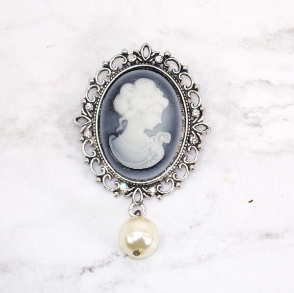 Brooch With a Woman White Figure With a Pearl Two