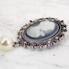 Brooch With a Woman White Figure With a Pearl Side