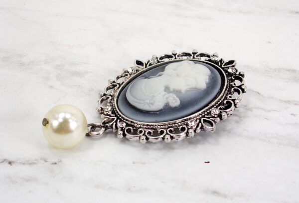 Brooch With a Woman White Figure With a Pearl Side
