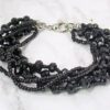 BLACK GLASS AND SEED BEAD MULTI STRAND BRACELET - Image 7