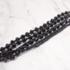 BLACK GLASS AND SEED BEAD MULTI STRAND BRACELET - Image 3