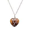 TREE OF LIFE PENDANT ON A TIGER EYE HEART STONE