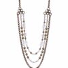 GOLD LAYERED NECKLACE WITH GLASS AND METAL BEADS IN AN ANTIQUE GOLD FINISH