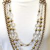 GOLD LAYERED NECKLACE WITH GLASS AND METAL BEADS IN AN ANTIQUE GOLD FINISH - Image 4