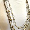 GOLD LAYERED NECKLACE WITH GLASS AND METAL BEADS IN AN ANTIQUE GOLD FINISH - Image 5