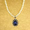 WHITE PEARL NECKLACE WITH BLUE CRYSTAL TEARDROP PENDANT - Image 3