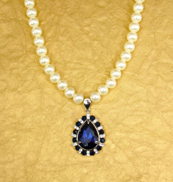 WHITE PEARL NECKLACE WITH BLUE CRYSTAL TEARDROP PENDANT - Image 3