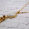 WHITE STONE PENDANT NECKLACE WITH TASSEL CHAIN - Image 3