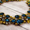 BLUE TEAL COLOR CRYSTAL STATEMENT NECKLACE IN ANTIQUE GOLD FINISH - Image 2