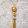 GOLD LEAF PENDANT NECKLACE WITH GOLD TASSEL CHAIN - Image 6