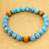 TURQUOISE STONE AND WOOD BEAD BRACELET - Image 6